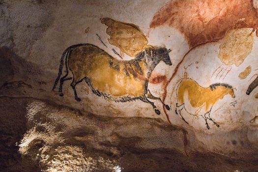 Historic Lascaux cave paintings depicting prehistoric horses in France